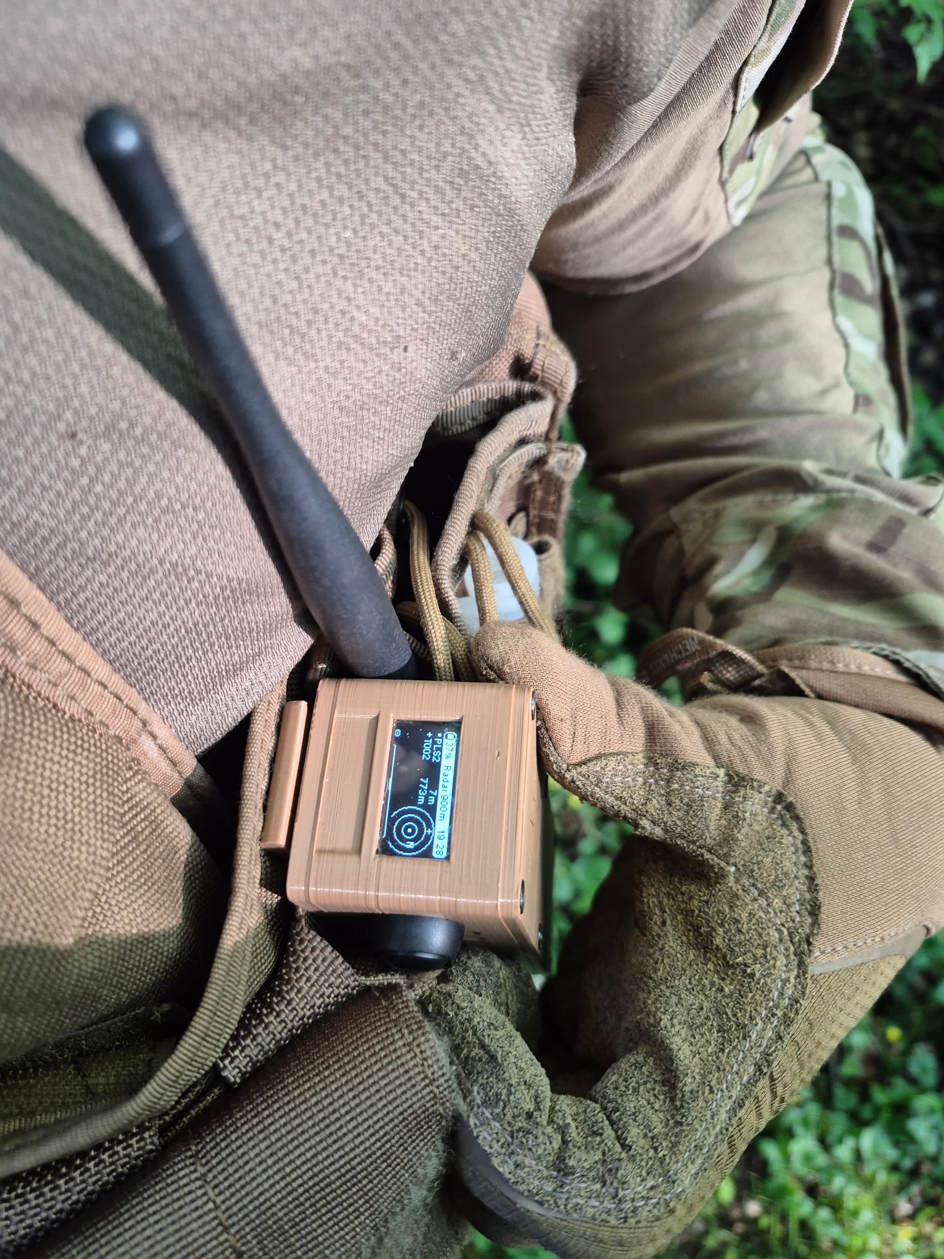 RBaken on chest rig with operator's glove resting on it