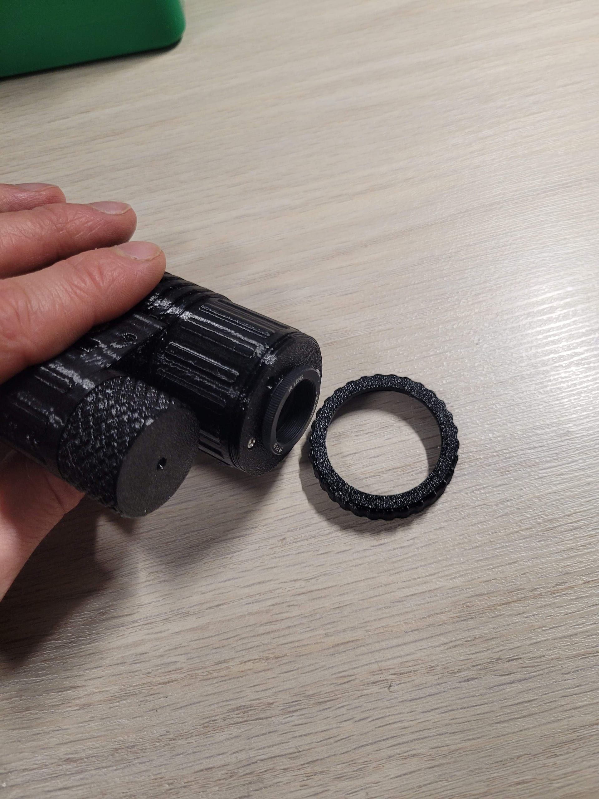 Housing side view showing mount and grip texture