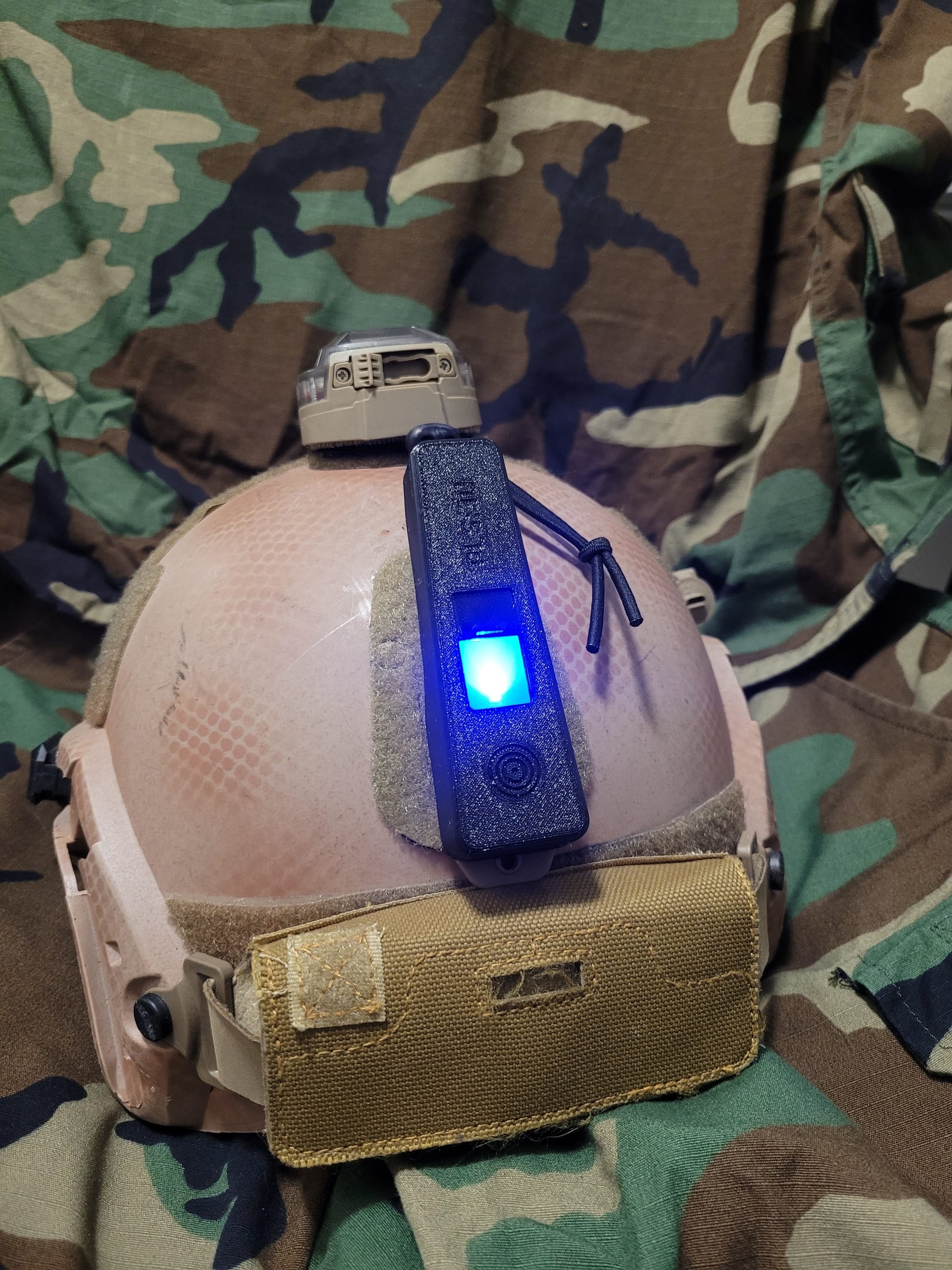 Cover on helmet glowing blue, aerial view